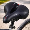 Bicycle saddle made of flexible foam with reflectors