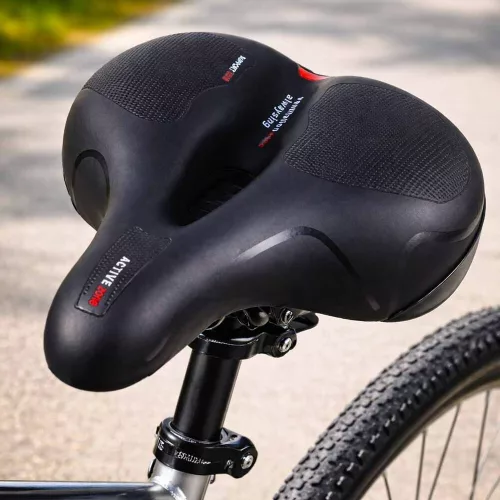 Bicycle saddle made of flexible foam with reflectors
