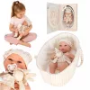 Baby doll in carrier with mascot beige