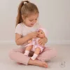 Baby doll in carrier with mascot pink