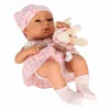 Baby doll in carrier with mascot pink