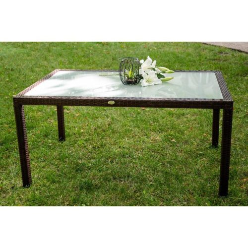 Table with brown rattan cover and glass top 90*150*74 cm