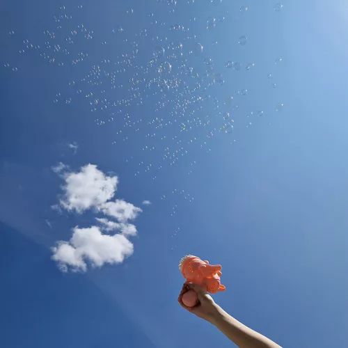 Soap bubble gun with wings pink
