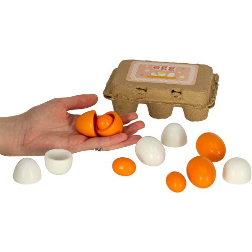 Toy egg with removable wooden yolk
