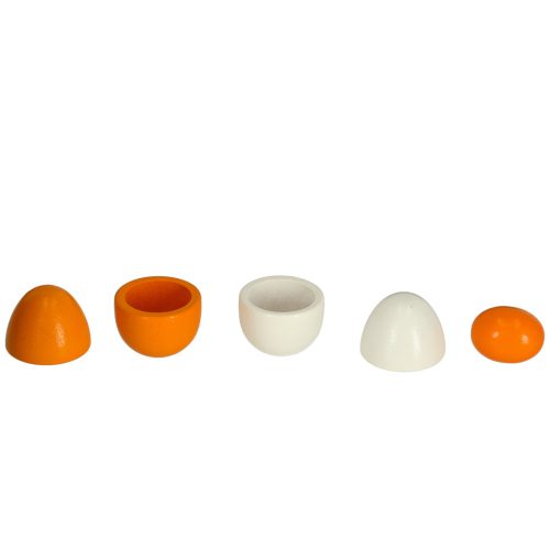 Toy egg with removable wooden yolk